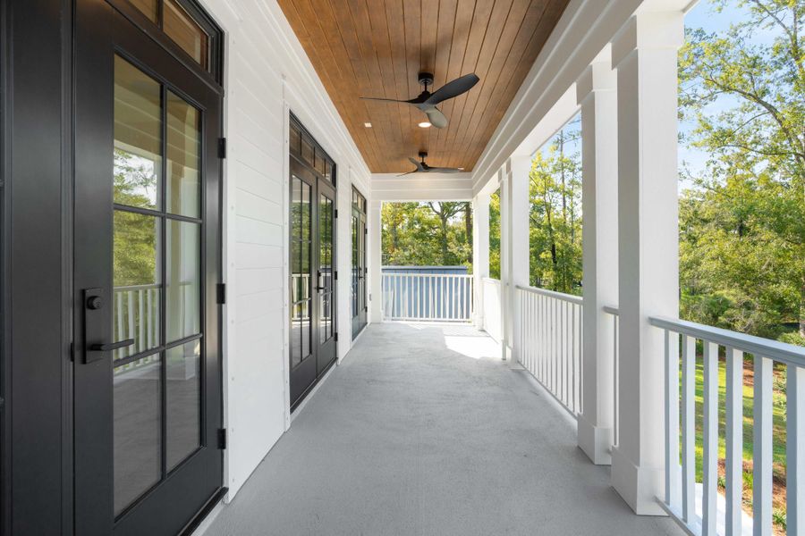 Exterior details and patio area of a home in , Ravenel (Image 36).