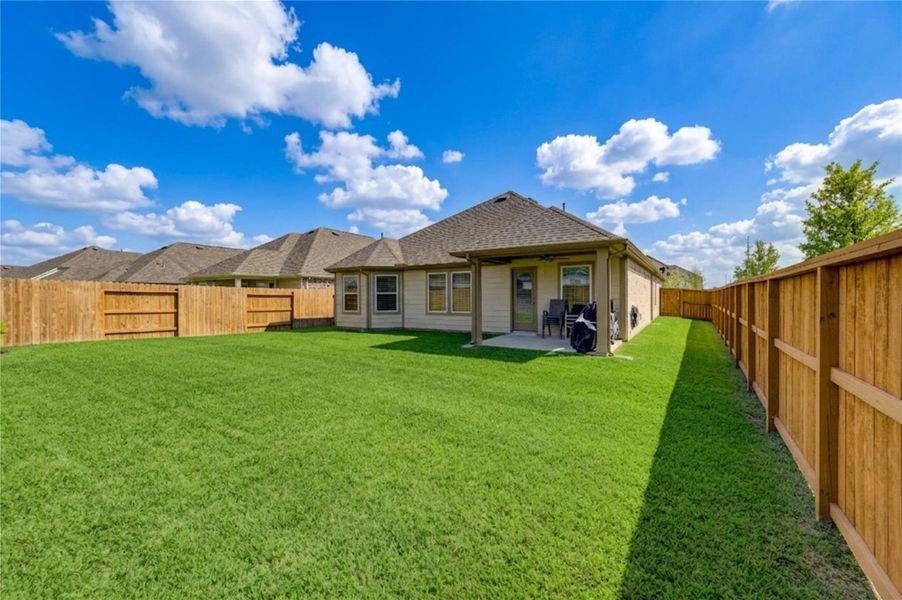 Exterior details and patio area of a home in Marvida, Cypress (Image 21).