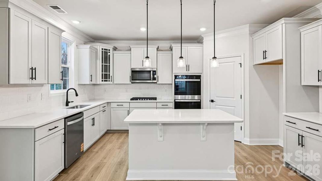 Furnished interior view inside a new home in Sylvan Creek, Denver (Image 3).