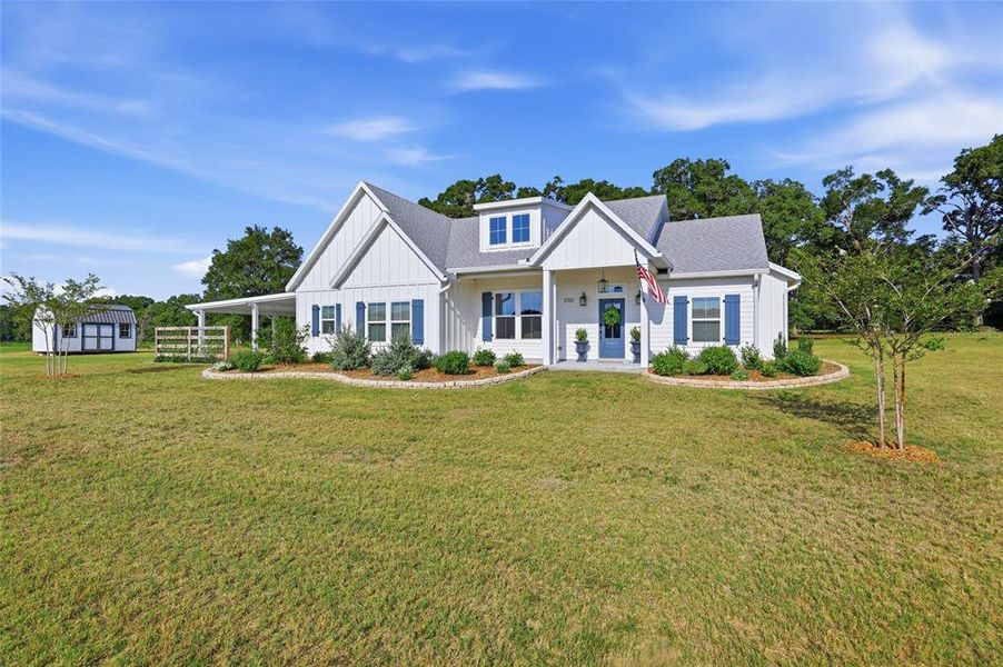 Front exterior of a new home in , Bell, FL, highlighting curb appeal (Image 1). Front exterior of a new home in , Bell, FL, highlighting curb appeal (Image 1).