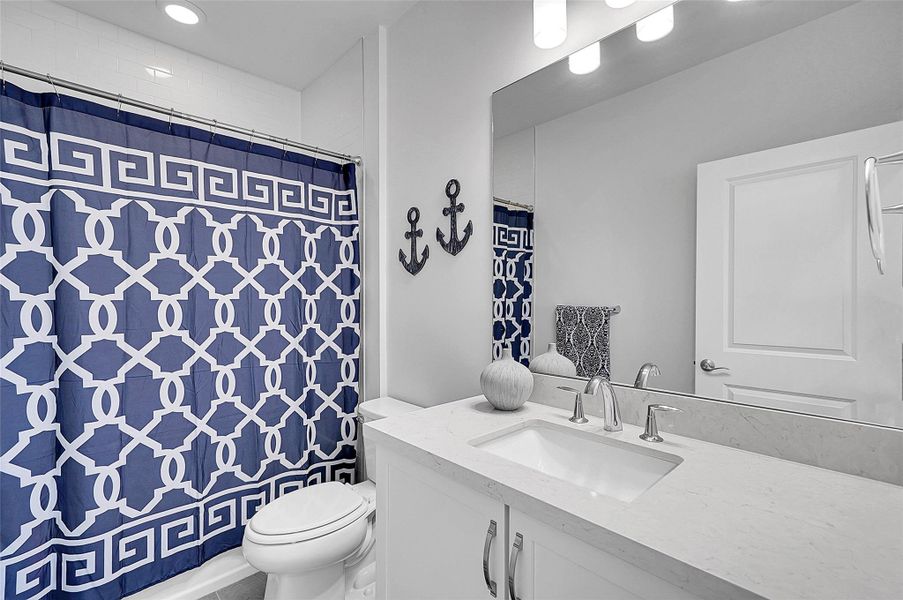 Full bath upstairs with bathtub.