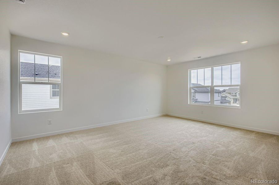 Spacious, unfurnished interior of a new home in Riano Ridge: The Pioneer Collection, Loveland (Image 10).