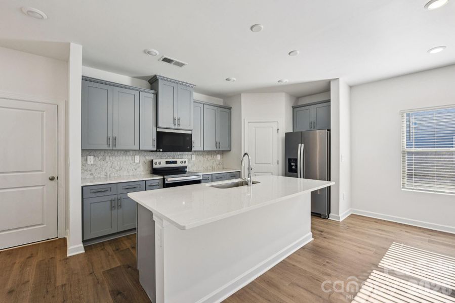 Photo is not of the actual home, but is an inspirational photo of builder’s model home and may depict options, furnishings, and/or decorator features that are not included