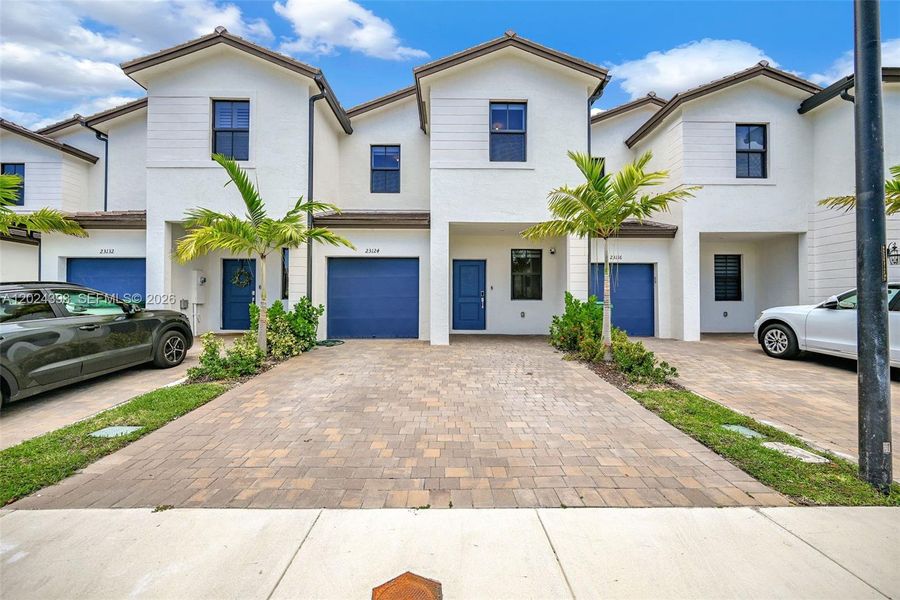 Front exterior of a new home in , Miami, FL, highlighting curb appeal (Image 30). Front exterior of a new home in , Miami, FL, highlighting curb appeal (Image 30).