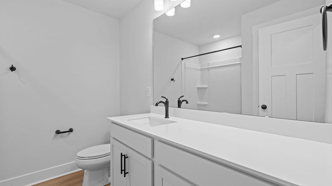 Stylish guest bathroom with superior design and thoughtful storage solutions