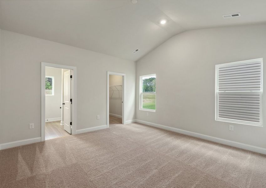 The master bedroom has lots of windows to let in natural light The master bedroom has lots of windows to let in natural light