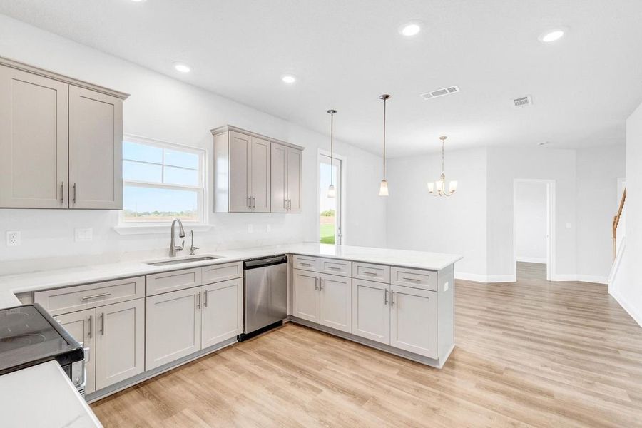 Representative furnished interior of a home built from the Plan 2290 by Adams Homes in College Station, Panama City (Image 9). Representative furnished interior of a home built from the Plan 2290 by Adams Homes in College Station, Panama City (Image 9).