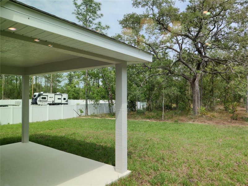 Exterior details and patio area of a home in Royal Highlands, Weeki Wachee (Image 2).