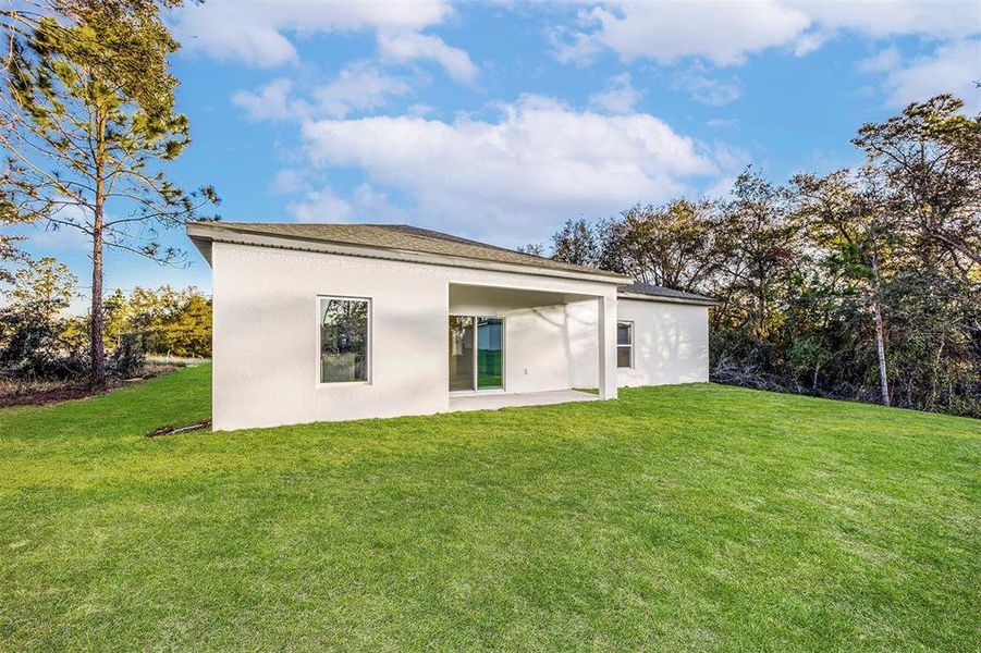 Exterior details and patio area of a home in Poinciana, Poinciana (Image 2). Exterior details and patio area of a home in Poinciana, Poinciana (Image 2).
