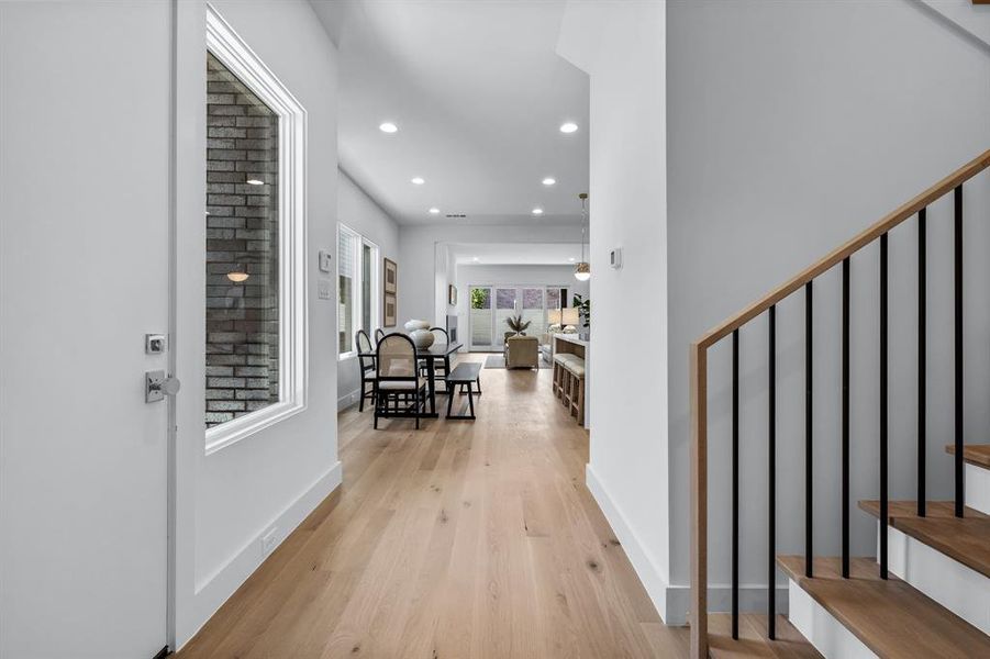 Foyer entrance featuring light hardwood / wood-style floors