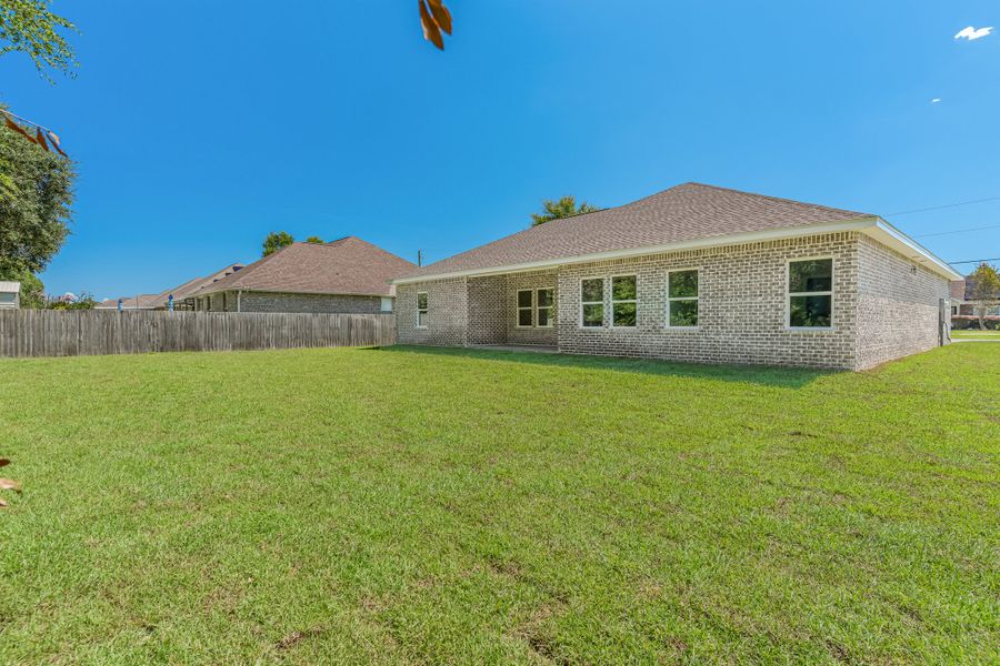 Exterior details and patio area of a home in Southern Day Chateau, Baker (Image 23).