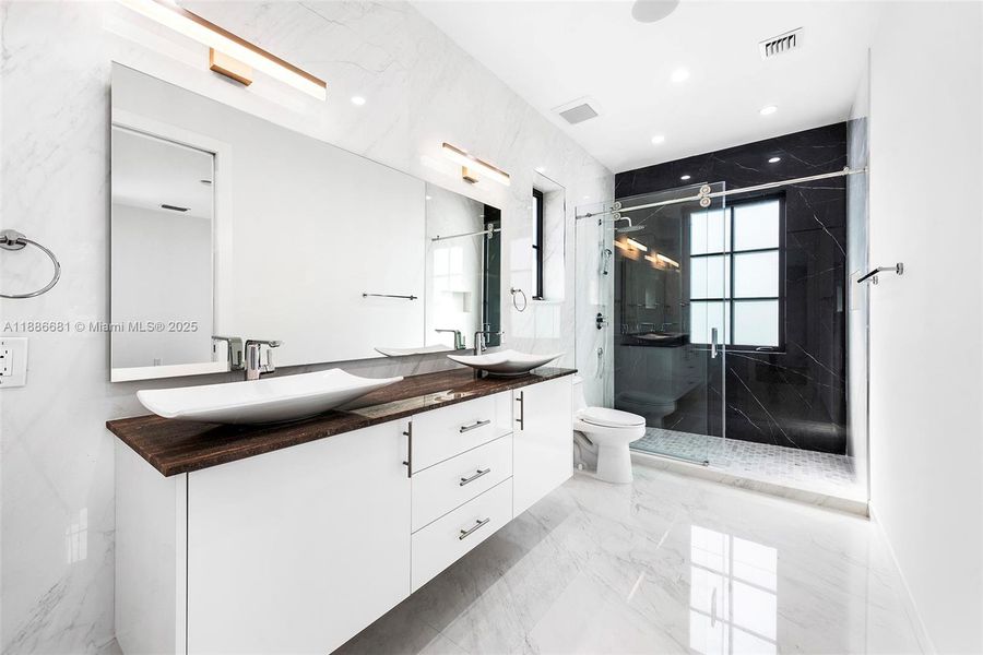 Furnished interior view inside a new home in , Coral Gables (Image 19). Furnished interior view inside a new home in , Coral Gables (Image 19).