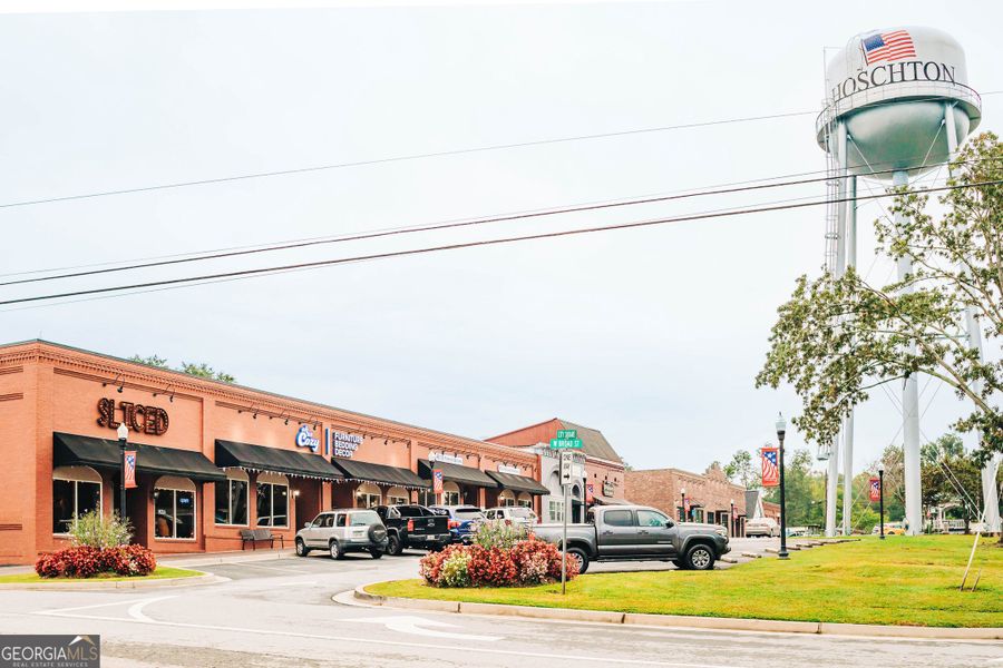 Front exterior of a new home in Rosewood Lake Estates, Hoschton, GA, highlighting curb appeal (Image 31).