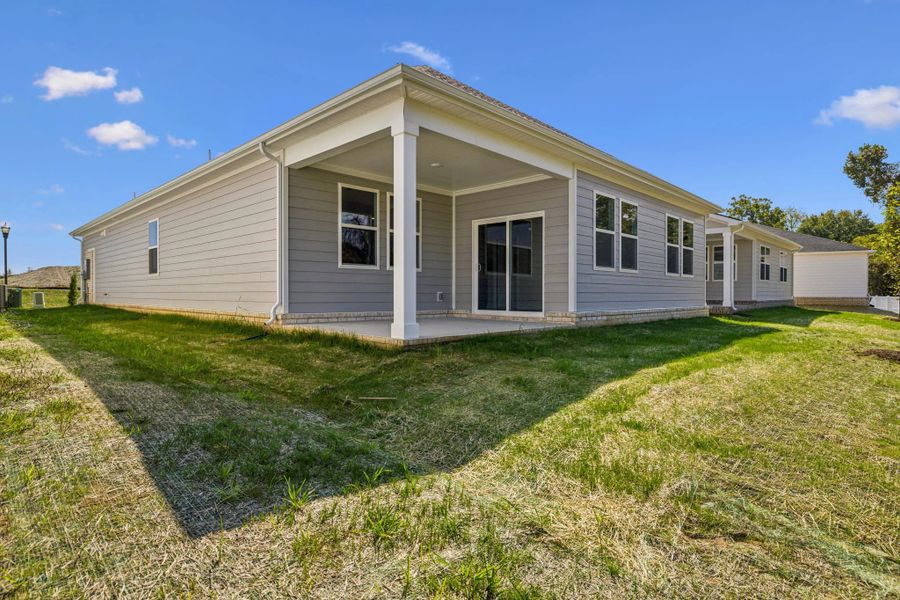 Exterior details and patio area of a home in Cedars at Cane Ridge | 55+ Community, Antioch (Image 21).