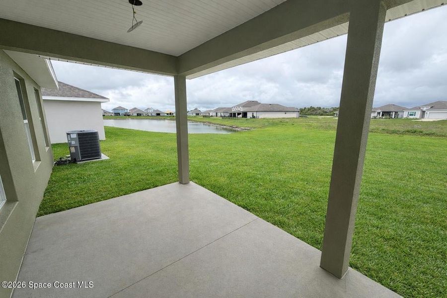 Exterior details and patio area of a home in St. John's Preserve, Palm Bay (Image 3).