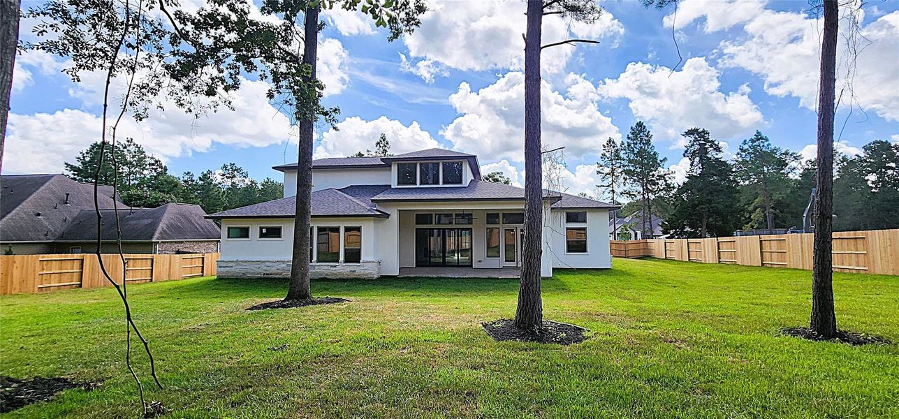 Front exterior of a new home in Stewart’s Forest, Conroe, TX, highlighting curb appeal (Image 12). Front exterior of a new home in Stewart’s Forest, Conroe, TX, highlighting curb appeal (Image 12).