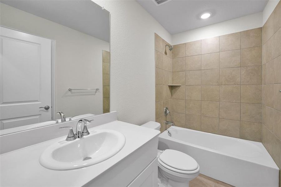 Bathroom with shower / bathtub combination and vanity Bathroom with shower / bathtub combination and vanity