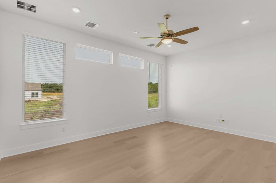 Representative unfurnished interior of a home built from the Franklin by Chesmar Homes in Feathergrass, Fulshear (Image 36).