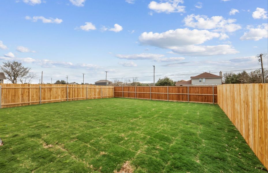 Exterior details and patio area of a home in Larson Crossing, Elgin (Image 23).
