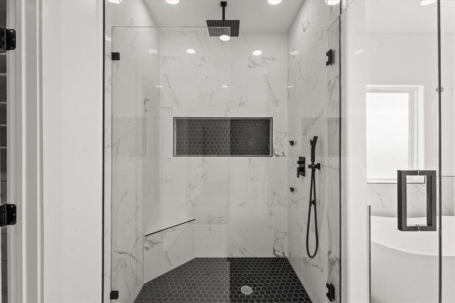 Bathroom with shower with separate bathtub