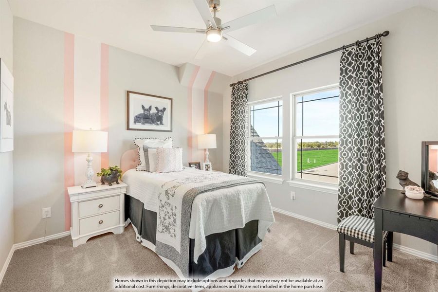 Bedroom with pink striped accent wall, ceiling fan, carpet, and windows with outdoor view