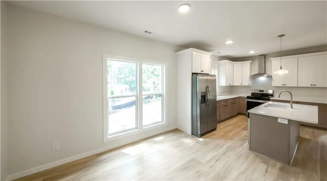 Furnished interior view inside a new home in , Carrollton (Image 3).