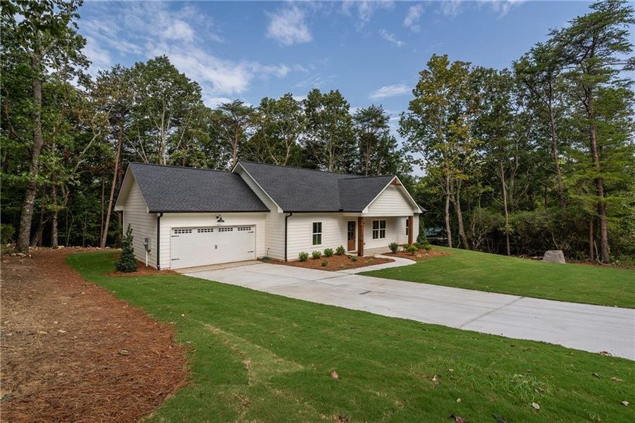 Front exterior of a new home in , Jasper, GA, highlighting curb appeal (Image 16).