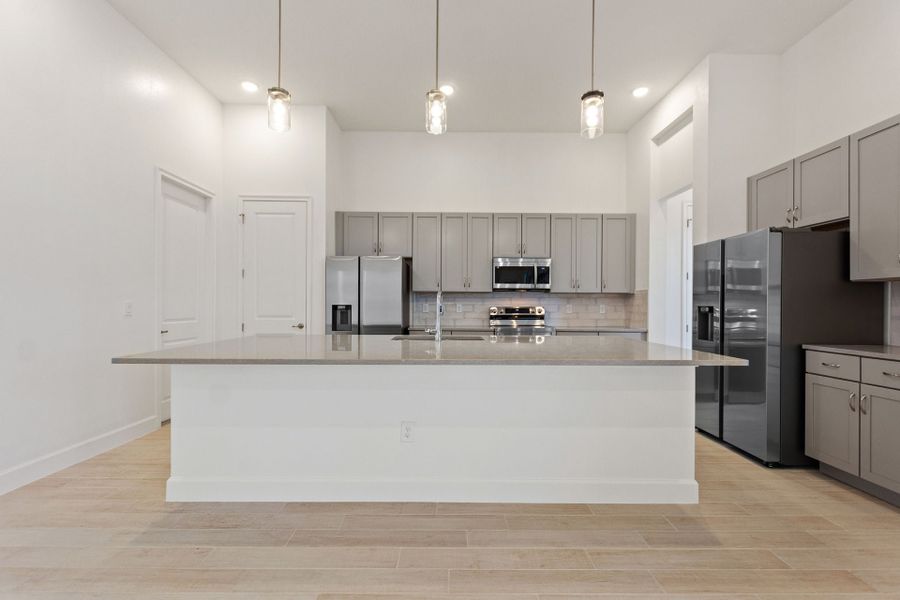 Representative furnished interior of a home built from the Oceanside by Park Square Residential in Paradiso Grande, Orlando (Image 9).
