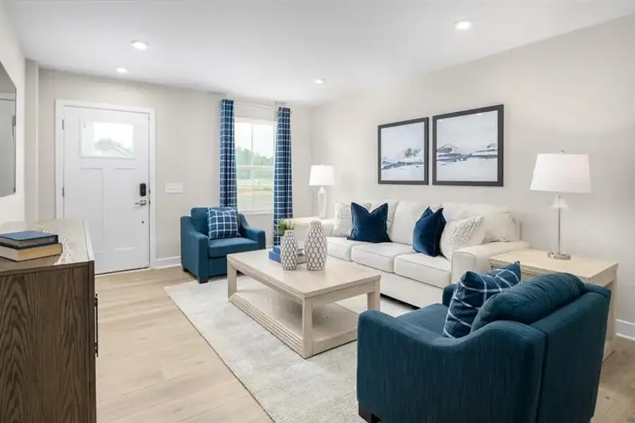 Representative furnished interior of a home built from the Nassau Cove - 3253 Edgehill Drive by Ryan Homes in Lakes at Riverbend, Navassa (Image 9).