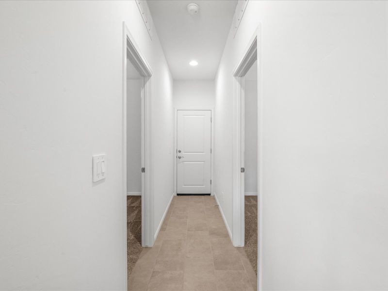 Spacious, unfurnished interior of a new home in Mandarina - Premier Series, Marana (Image 9). Spacious, unfurnished interior of a new home in Mandarina - Premier Series, Marana (Image 9).