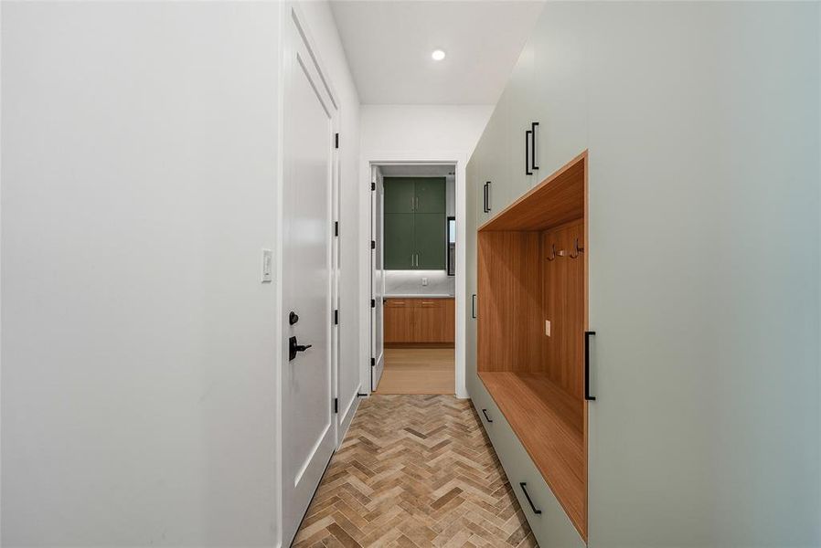 Mudroom featuring brick floors and recessed lighting Mudroom featuring brick floors and recessed lighting