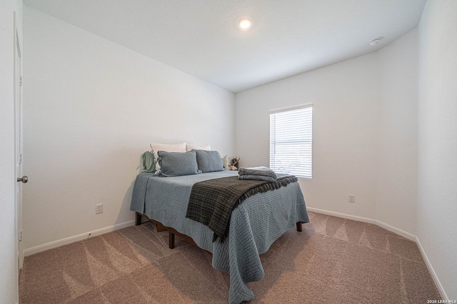 Furnished interior view inside a new home in Hidden Trails, Bulverde (Image 17).