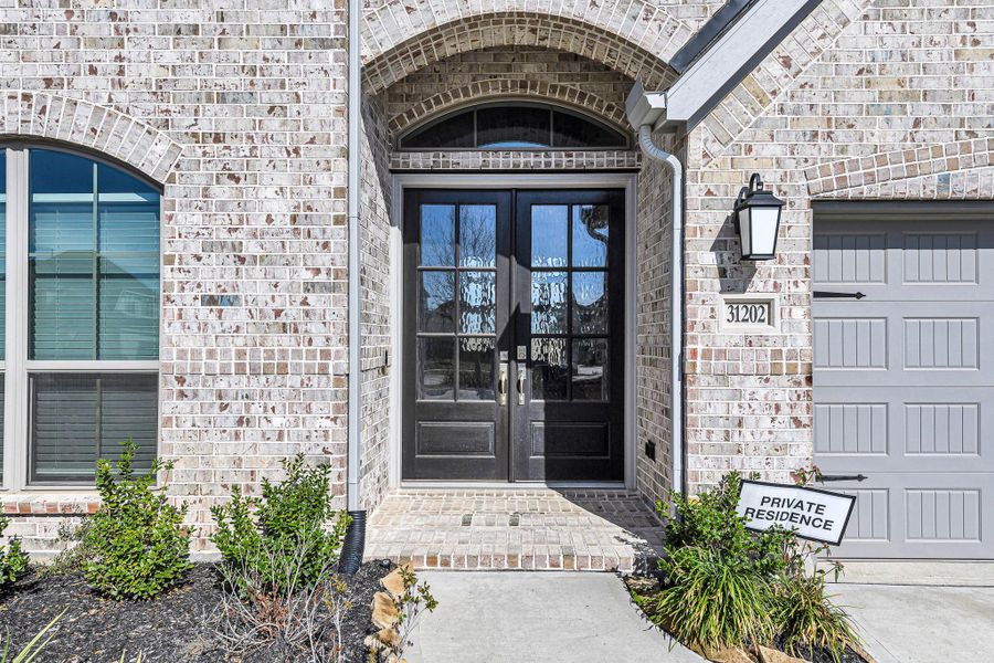 Exterior details and patio area of a home in Cross Creek West 55', Fulshear (Image 28). Exterior details and patio area of a home in Cross Creek West 55', Fulshear (Image 28).