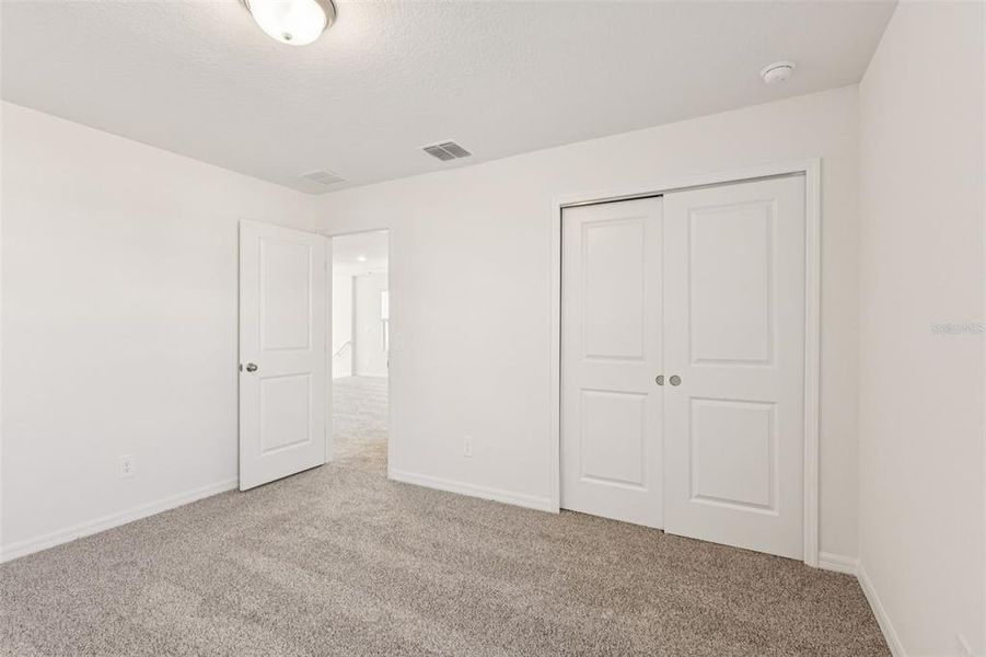 Spacious, unfurnished interior of a new home in The Reserve at Hammock Oaks - Classic Series, Lady Lake (Image 19).