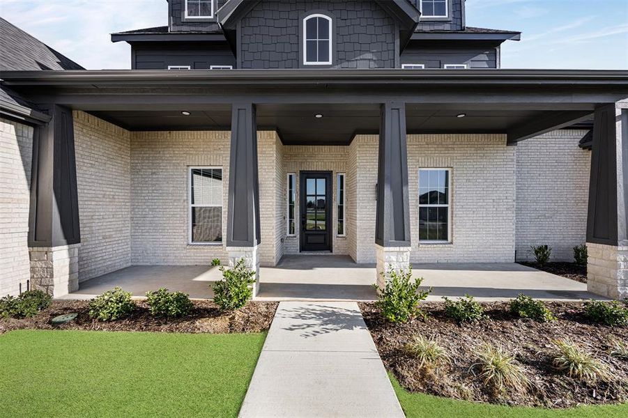 Exterior details and patio area of a home in Waterfall Ranch - 1 Acre Lots, Waxahachie (Image 3).