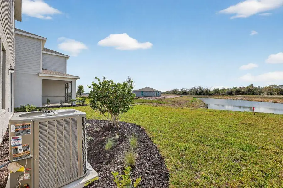 Exterior details and patio area of a home in Firethorn, Parrish (Image 4).