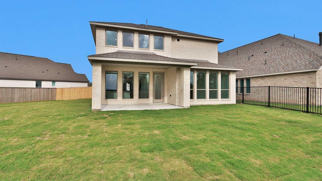 Exterior details and patio area of a home in Bridgeland, Cypress (Image 2). Exterior details and patio area of a home in Bridgeland, Cypress (Image 2).