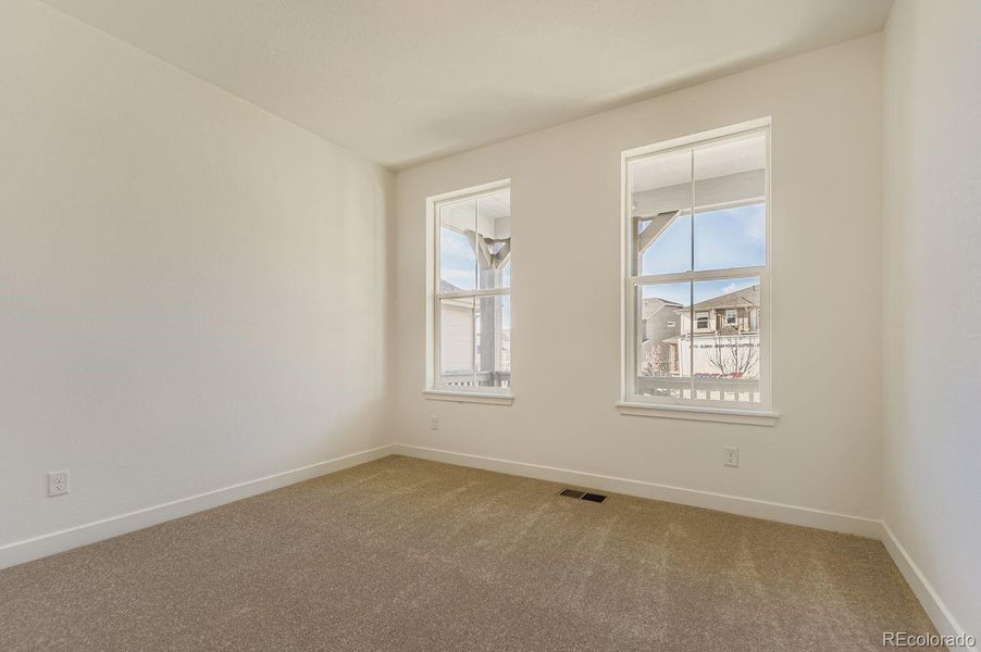 Spacious, unfurnished interior of a new home in Newlin Crossing: The Monarch Collection, Parker (Image 8).