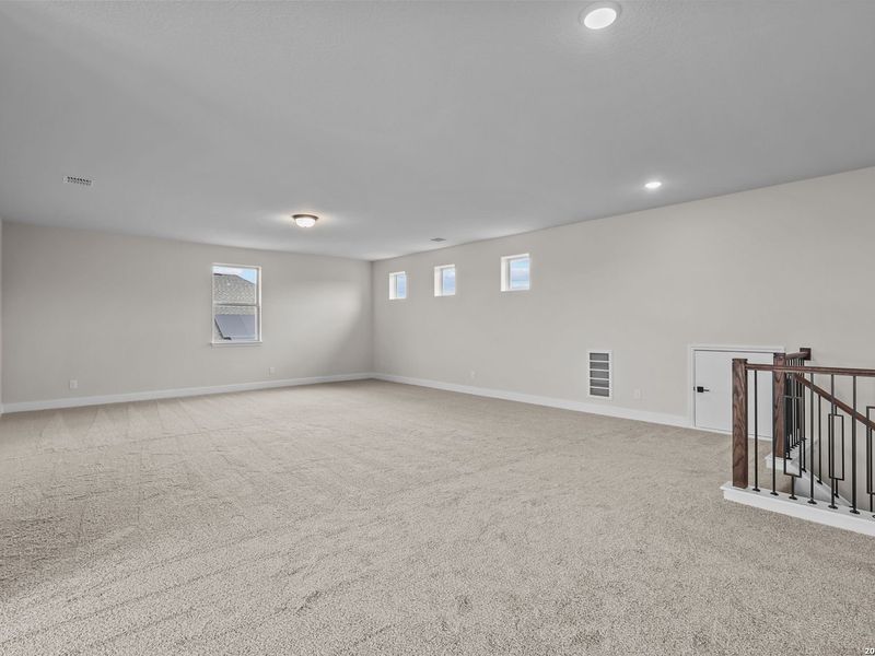 Spacious, unfurnished interior of a new home in The Reserve at Potranco Oaks, Castroville (Image 28).