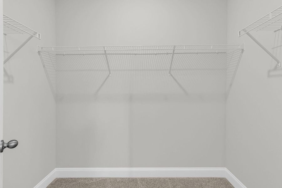 Spacious, unfurnished interior of a new home in Tidewater at Lakes of Cane Bay, Summerville (Image 21).