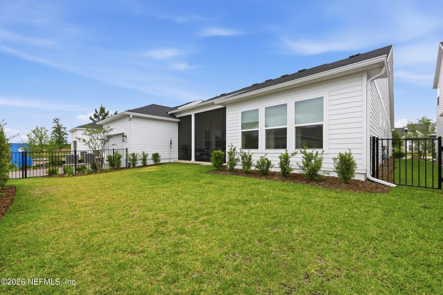 Exterior details and patio area of a home in Seven Pines 70' Rear Entry, Jacksonville (Image 38).