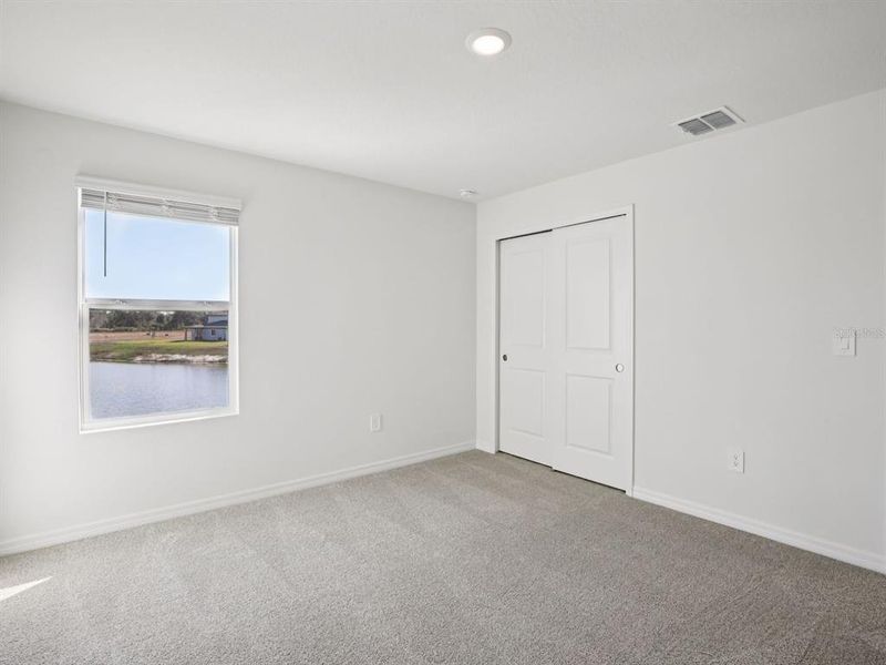 Spacious, unfurnished interior of a new home in Oakfield Trails - Premier Series, Parrish (Image 18).
