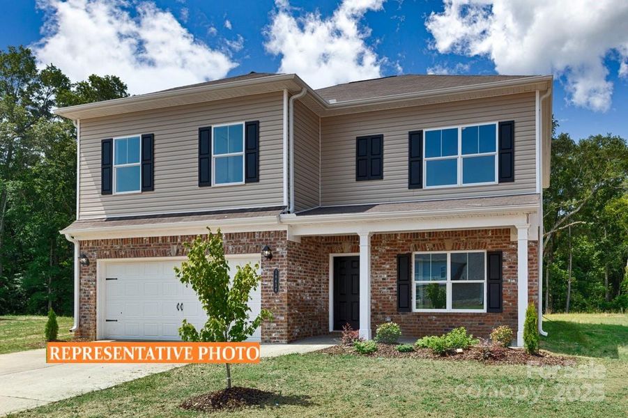 Front exterior of a new home in Cedar Meadows, Monroe, NC, highlighting curb appeal (Image 1).