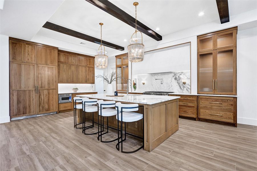 Custom Kitchen with Thermador appliance package and custom lighting