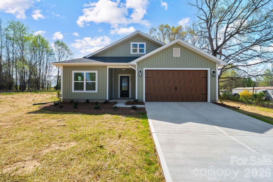 Front exterior of a new home in , Lawndale, NC, highlighting curb appeal (Image 25).