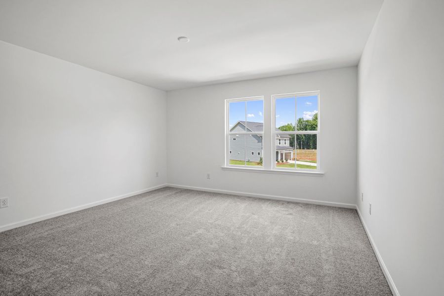 Spacious, unfurnished interior of a new home in Michaux Gardens, Belmont (Image 49).