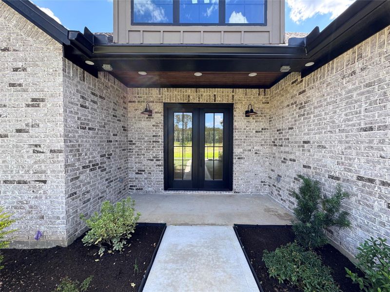 Exterior details and patio area of a home in , Conroe (Image 2). Exterior details and patio area of a home in , Conroe (Image 2).