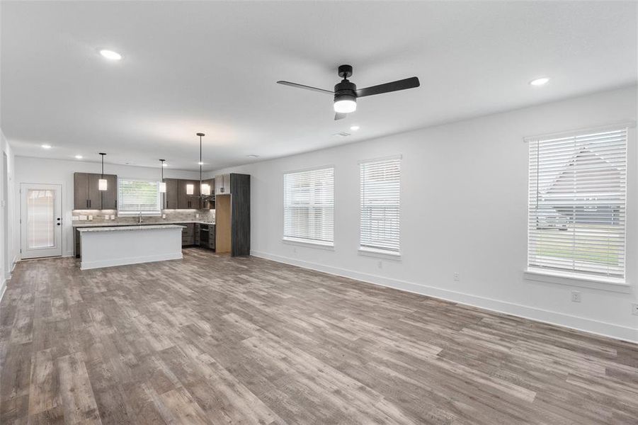 Open concept living, dining and kitchen Open concept living, dining and kitchen