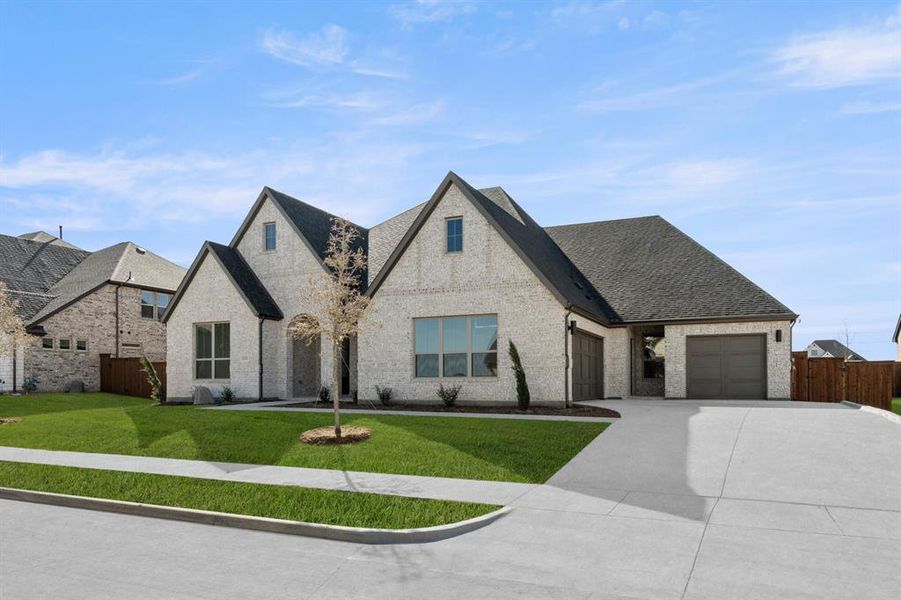 Front exterior of a new home in Rockwood 90', Mansfield, TX, highlighting curb appeal (Image 24).