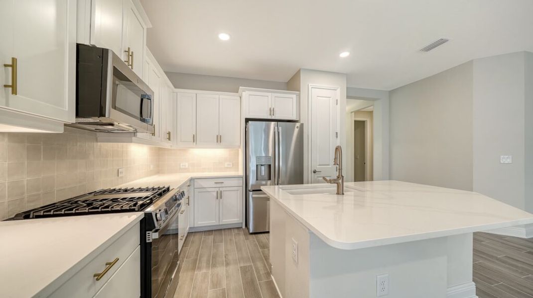 Furnished interior view inside a new home in Windward Real Estate and Homes for Sale in Sarasota, FL - Neal Communities, Lakewood Ranch (Image 8).